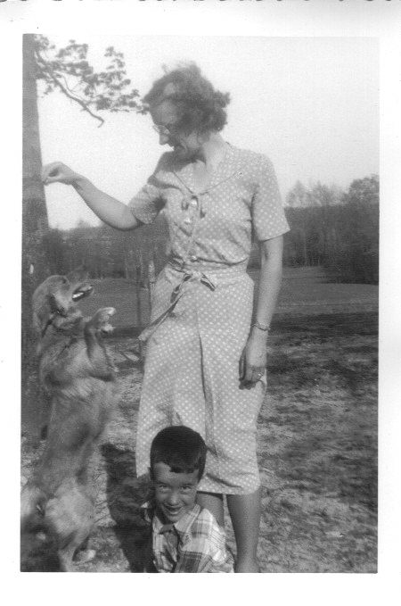 On the family farm in the winter with Mom and my Puppy.